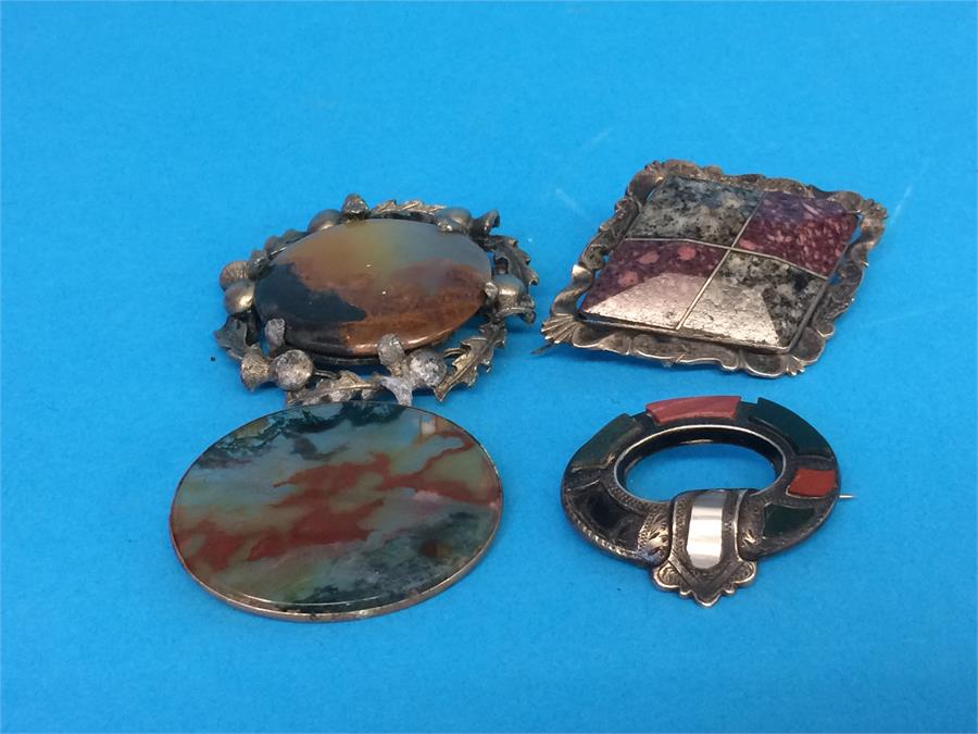 Four Scottish and agate set brooches