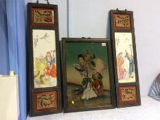 A pair of Chinese porcelain panels and a painted glass panel (3)