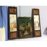 A pair of Chinese porcelain panels and a painted glass panel (3)