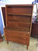 A Danish teak open bookcase below three long drawers by Edward Valentinsen