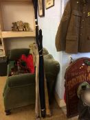 A selection of fishing rods including Hardy etc.
