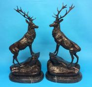 A pair of model bronze stags, after Moigniers