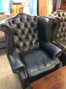 A good quality Chesterfield buttoned high back arm chair