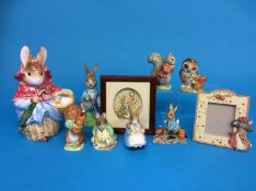 A collection of Beatrix Potter figures