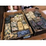 Two trays of model tanks