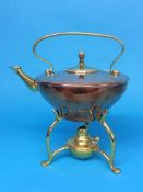 A copper and brass Arts and Crafts spirit kettle by W.A.S. Benson