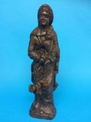 A carved wood figure of the Madonna and child, 43cm high