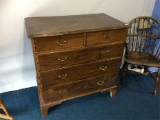 A Georgian mahogany straight front chest of two short and three long drawers, 95cm wide