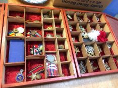 A collection of various reproduction and original badges and medals
