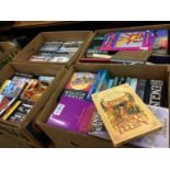 Four boxes of books and DVDs