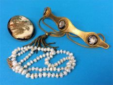 An oval satsuma brooch, string of pearls with a 9ct gold clasp, and a gilt metal hair clip set