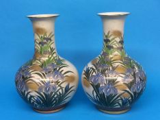 A pair of Japanese decorative vases, 39cm high