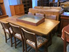 An oak Arts and Crafts style bureau, sideboard, refectory table and six chairs