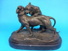 After C.Valton, bronze model of two lions fighting