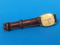 A Gents Omega De Ville wrist watch, stamped '18k', with quartz movement
