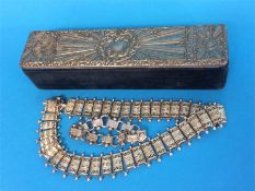 A silver coloured Victorian collarette and a bracelet