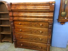 A Victorian mahogany straight front chest of drawers, with two cushion drawers below four long