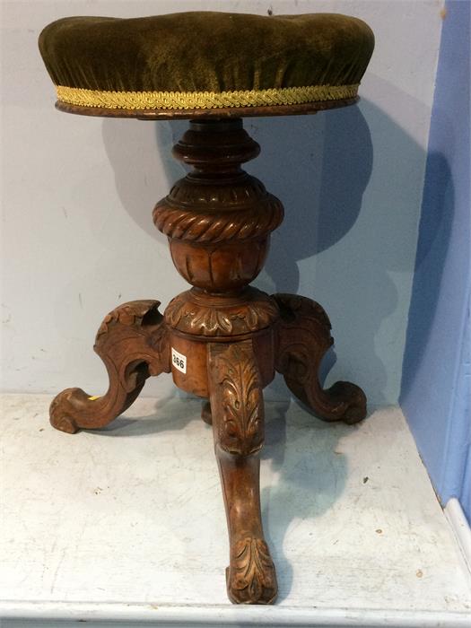 A Victorian circular top carved piano stool - Image 2 of 2