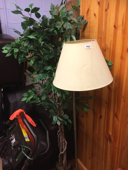 An artificial tree and a lamp