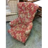 A rouge floral pattern button back chair