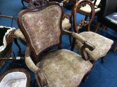 Walnut open armchair and three Victorian walnut chairs