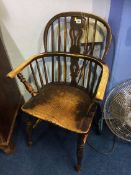 A stick back Windsor chair