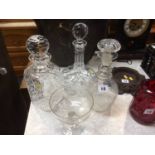 Three decanters and an etched glass (4)