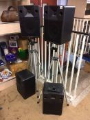 Four speakers and stands