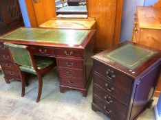 A reproduction mahogany pedestal desk, a matching filing cabinet and a Chesterfield chair