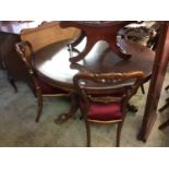 Mahogany circular breakfast table and three Victorian chairs