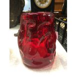 A red Whitefriars vase