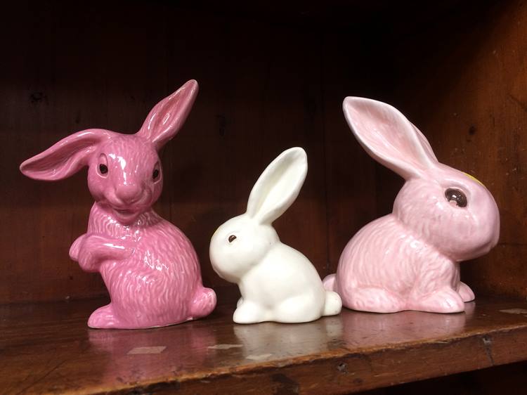 A rare pink Sylvac rabbit, numbered 1303, 17.5cm high and 2 other Sylvac rabbits