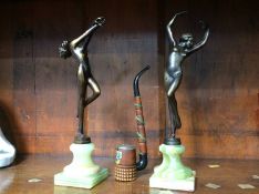 Two Art Deco style female ballerinas, on onyx plinths and a pipe