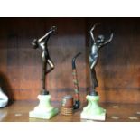 Two Art Deco style female ballerinas, on onyx plinths and a pipe