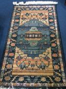 Two small Persian design rugs