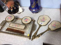 A seven piece dressing table set