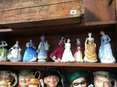 Nine Doulton, Lladro and Worcester figures