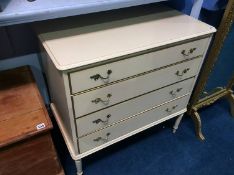 Cream four drawer chest of drawers