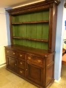 A stained pine dresser