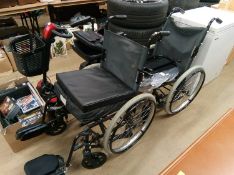 Two wheelchairs