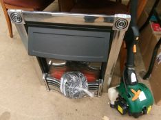 Petrol strimmer and an electric fire