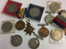 Three matched World War I medals, including Mercan