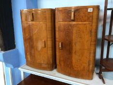 Pair of walnut Art Deco bow front bedside cabinets