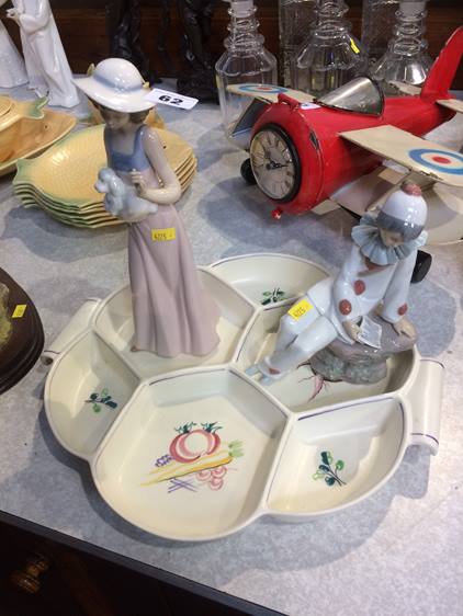 Two Nao figures and a Poole dish