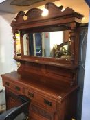 An Edwardian mirror back sideboard