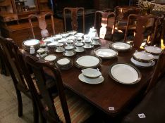 Mahogany dining table and seven chairs