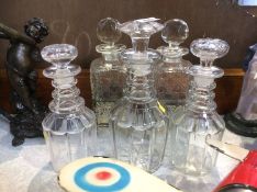 Five cut glass decanters