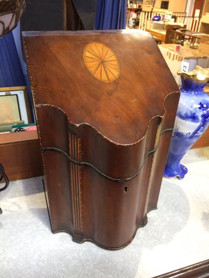 A mahogany knife box