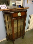 A walnut china cabinet