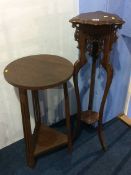 Oak Arts and Crafts style occasional table and a pierced fretwork pedestal